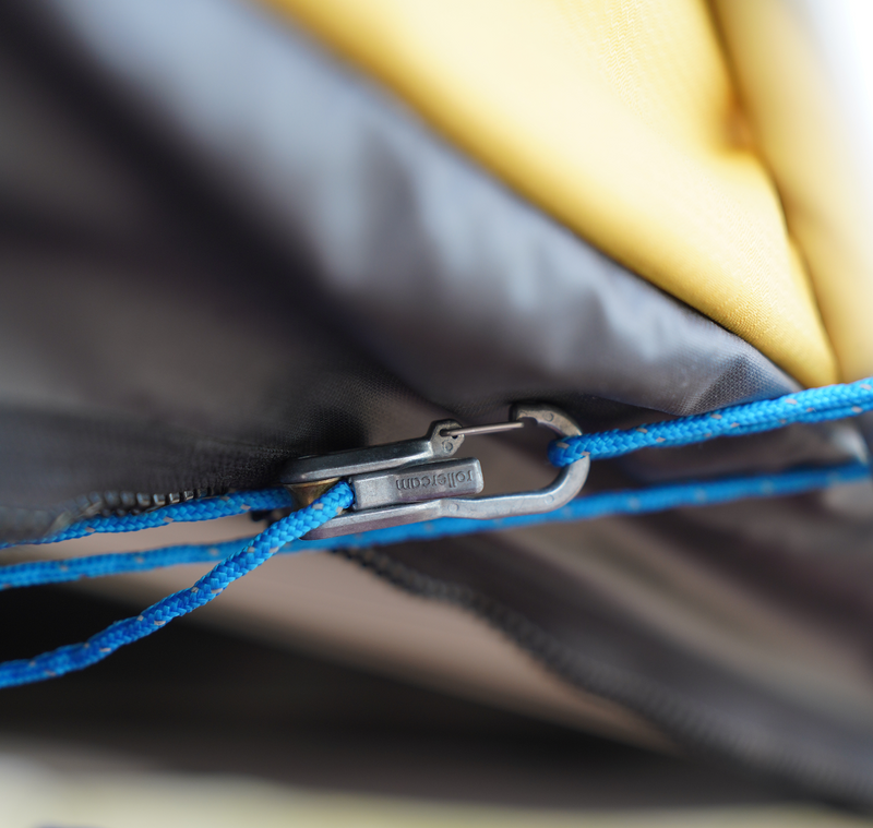 Close-up of a Roperoller paracord cam lock securing a rooftop tent ladder